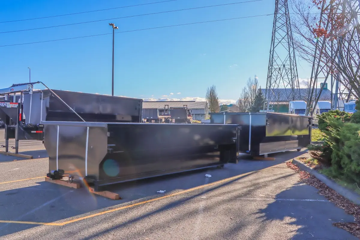 Roll-off dumpster ready for waste disposal at job site for 3 Yard Dumpster Rental in Alexandria